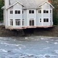House in Alaska collapses in river
