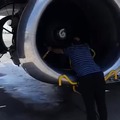 Cleaning a plane engine