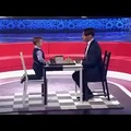 child tries to play chess with his stepfather loses and has to meet the challenge