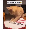 Blessing the pizza