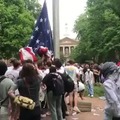 Students protecting American flag