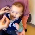 Kid hears for the first time