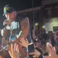 A baby was crowd-surfed at a Flo Rida concert- He held the baby up like simba