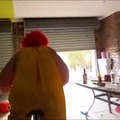Ronald McDonald steals a bike, drinks red bull and shatters a car windscreen (credit; RackaRacka-Orginal Video deleted for violating youtube t&cs)